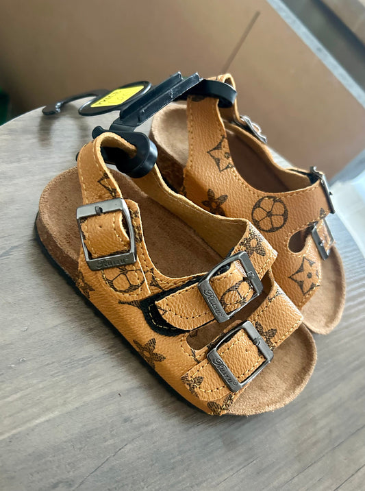 Saddle up “LV” sandals